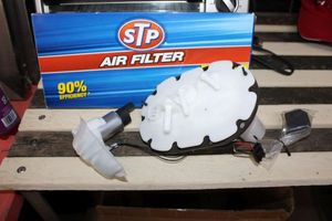 lot 192 image: 2001 Subaru fuel pump - never used and STP air filter SA9113