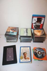 lot 252 image: CDs, BlueRay disc, and books