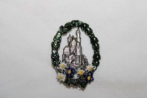 lot 268 image: Enamel fashion jewelry castle pin