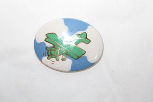 lot 275 image: Enamel fashion jewelry airplane pin