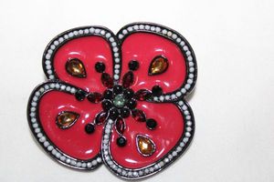 lot 295 image: Enamel fashion jewelry flower pin, needs attention or repurposed
