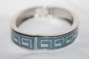 lot 304 image: Enamel fashion jewelry blue hinged bracelet