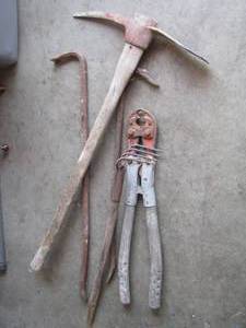 lot 13 image: Tools- crowbar, mallet, and bolt cutter