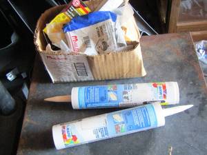 lot 85 image: Tools and Grout Caulk plus