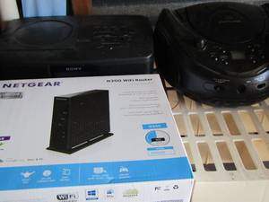 lot 105 image: Netgear router and power strips and more