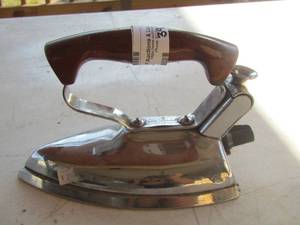 lot 39 image: metal iron with handle no power cord automatic lady hibbard model h100