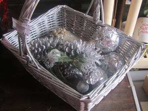 lot 184 image: Basket with silver balls and pinecones