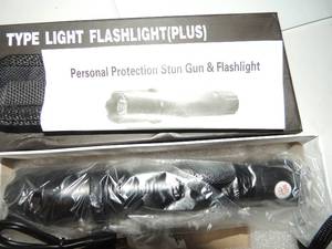 lot 207 image: 1101 TYPE FLASHLIGHT STUNGUN - SELF PROTECTION - NEW IN BOX , USB CHARGE W CORD -  NEW 