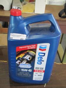 lot 83 image: Chevron delo 15w-40 heavy duty diesel engine oil barley used