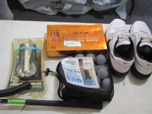 lot 63 image: Nike golfing shoes size 9 used- golf balls and 1 golf club