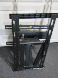 lot 105 image: 2 TV mounts used, unsure if all pieces are included