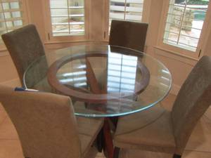 lot 154 image: Glass top dining table with wooden base very beautiful piece of furniture  &  4  DINING Chairs  times the $$