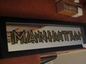 lot 191 image: Manhattan mirrored wall sign