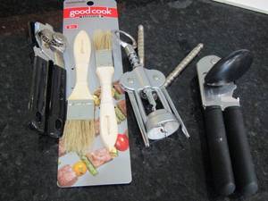 lot 41 image: 2 hand can openers- cork remover - meat brushes