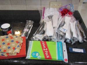 lot 44 image: plastic utensils galore- napkins- table covers- Halloween dcor