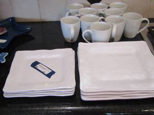 lot 47 image: white plastic plates, saucers, coffee mugs