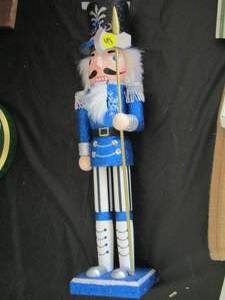 lot 21 image: blue clothed nut cracker