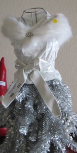 lot 202 image: HOLIDAY DECORE DRESS FORM - SILVER GARLAND SKIRT & WHITETOP  .MATCHES LOT 16