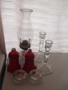 lot 28 image: CLEAR GLASS Oil lamp,  RED CANDLE TOPS W CLEAR CANDLEHOLDER plus