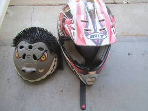lot 51 image: Bilt dirt bike helmet- kids bicycle helmet both used