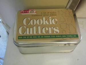 lot 66 image: Cookie cutters in original tin can