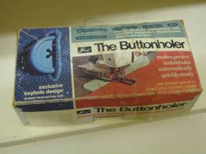 lot 103 image: The Buttonholer in original box