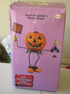 lot 203 image: jack o lantern metal stand