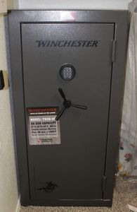 lot 2 image: Winchester  Touch pad Gun Safe Model TS26-45, 26 Gun Capacity 57x28wx 20D, 363 Pounds Fire Limit 45 min at 1400F. BUYER MUST BRING HELP AND EQUIPMENT TO REMOVE THIS, THERE WILL BE NO HELP ONSITE. HAVE COMBO AND RESET PAPERWORK FOR SAFE