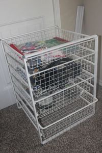 lot 41 image: White Metal Wire Drawer Set with Contents
