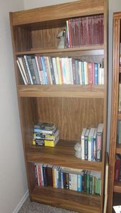 lot 43 image: Tall Wooden Bookcase with Light, Contents not Included 30x18x75
