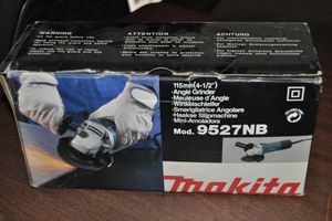 lot 282 image: Makita 4 12 inch Electric Grinder, with extra Rock Wheels