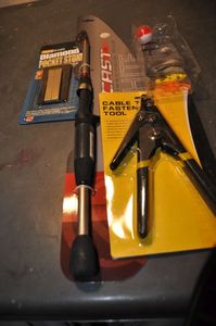 lot 306 image: Cable Tie Tool, Fishing accessories and Sharpening Stone