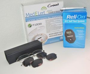 lot 130 image: Wellness Items, Reli On Meter in Original Box, Med Elert Pill Organizer, Thermometer and Eyeglasses with magnetic Sunglasses