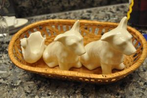 lot 141 image: White Ceramic Dogs and Geese in Basket
