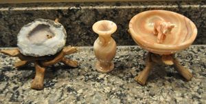 lot 152 image: Oco Agate from Mexico, Small Alabaster Italian Vase, Yellow Alabaster Bowl Hand carved, and Small Hand Carved Alabaster Elephant and Two Hand Carved 3-Legged Interlocking Dog Stands