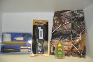 lot 174 image: Snake Chin Guards, Gun Lock and Shotgun Cleaning Kit