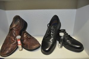 lot 175 image: Mens size 10 Leather shoes. Black Pair are Dockers