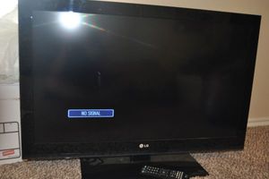 lot 209 image: 37 inch LG TV with Remote