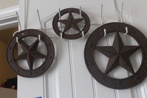 lot 333 image: Three Different Sized Lone Stars, Approx. 6.5, 8, and 11 Across, These are heavy Possibly Cast iron