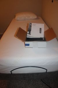 lot 77 image: Twin XL Adjustable Bed, Comes with Hardware to Connect a Headboard also Can be a King Size with the Second one listed (lot 75). Mattress is Avail, Clean and Has always been covered.