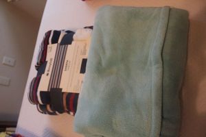 lot 85 image: Throw Blanket new in Package and Blue Throw Blanket