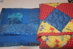 lot 86 image: Two Throw Size Prayer Quilts