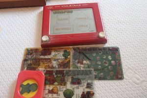 lot 95 image: Etch Sketch and Travel spirograph