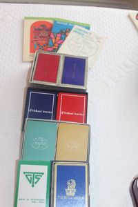 lot 98 image: Eight Decks of Bridge Cards and Several Score Pads