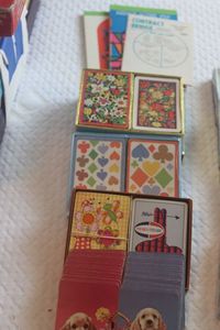 lot 100 image: Eight Decks of Bridge Cards and Several Score Pads