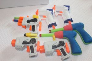 lot 106 image: Seven Soft Dart Guns