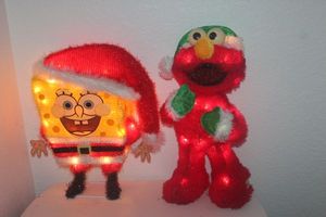 lot 111 image: Christmas Dcor Light up SpongeBob Square Pants and Elmo