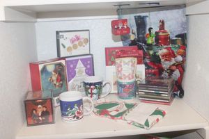 lot 112 image: Christmas Dcor Christmas and Easter Greeting Cards, Coffee Mugs, Christmas Music CDs and Hand Towel