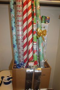 lot 117 image: Christmas and Multipurpose Wrapping paper, Some never opened, Several spools of Ribbon and Several Bows