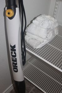 lot 225 image: Oreck Floor Steam Cleaner with Attachments and Pads